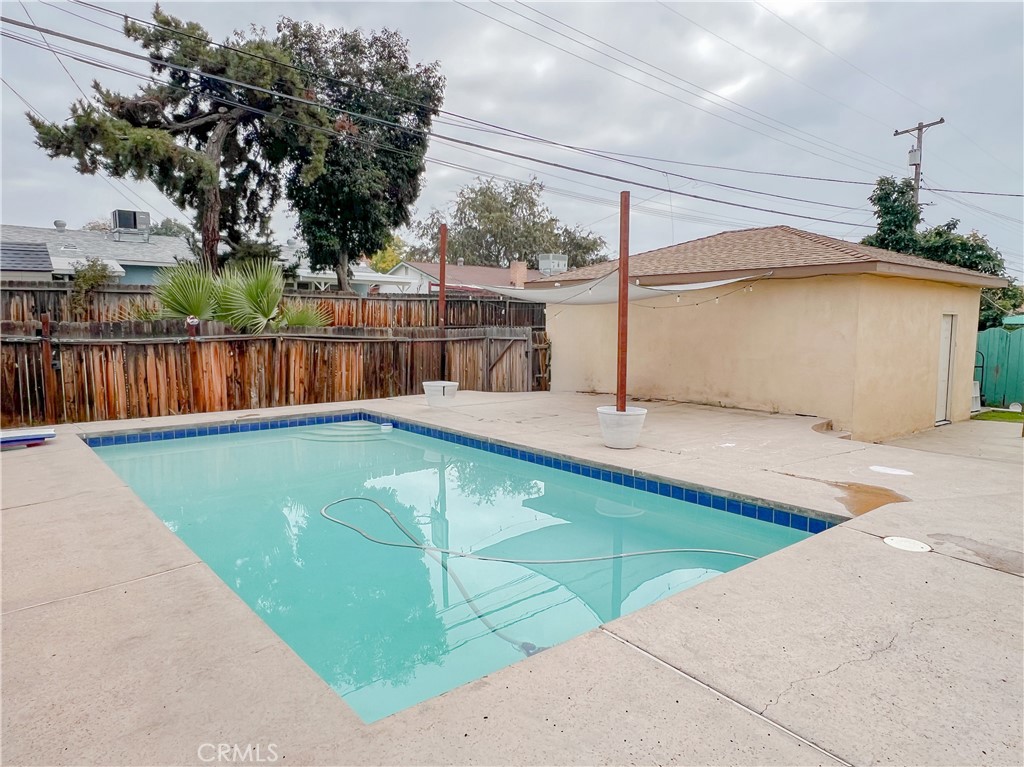 3013 Cornell Street Bakersfield, CA 93305 - Photo 16 of 20 a view of a balcony with a swimming pool
