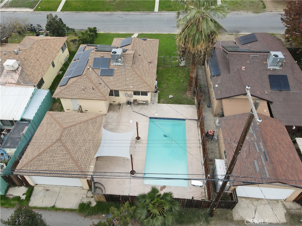 3013 Cornell Street Bakersfield, CA 93305 - Photo 4 of 20 an aerial view of a house with table and chairs