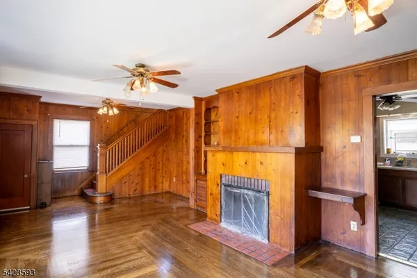 a view of entryway with wooden floor