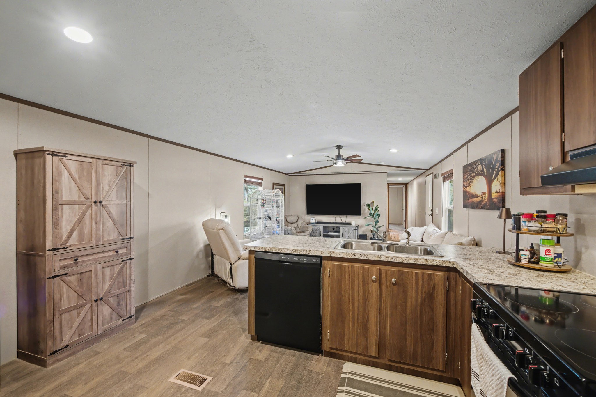 116 Lee Lane Big Rock, TN 37023 - Photo 13 of 34 a kitchen with kitchen island a refrigerator stove and sink