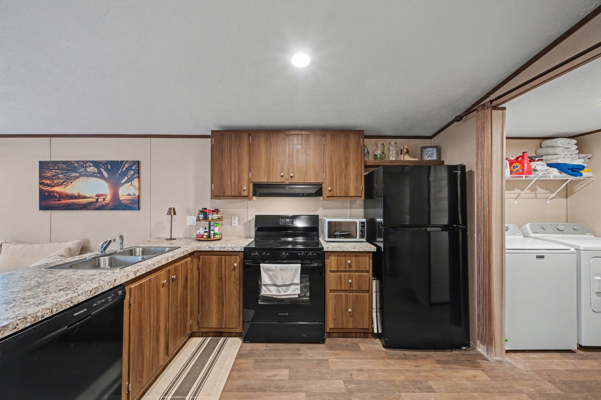 116 Lee Lane Big Rock, TN 37023 - Photo 14 of 34 a kitchen with stainless steel appliances granite countertop a refrigerator a stove a sink and a microwave