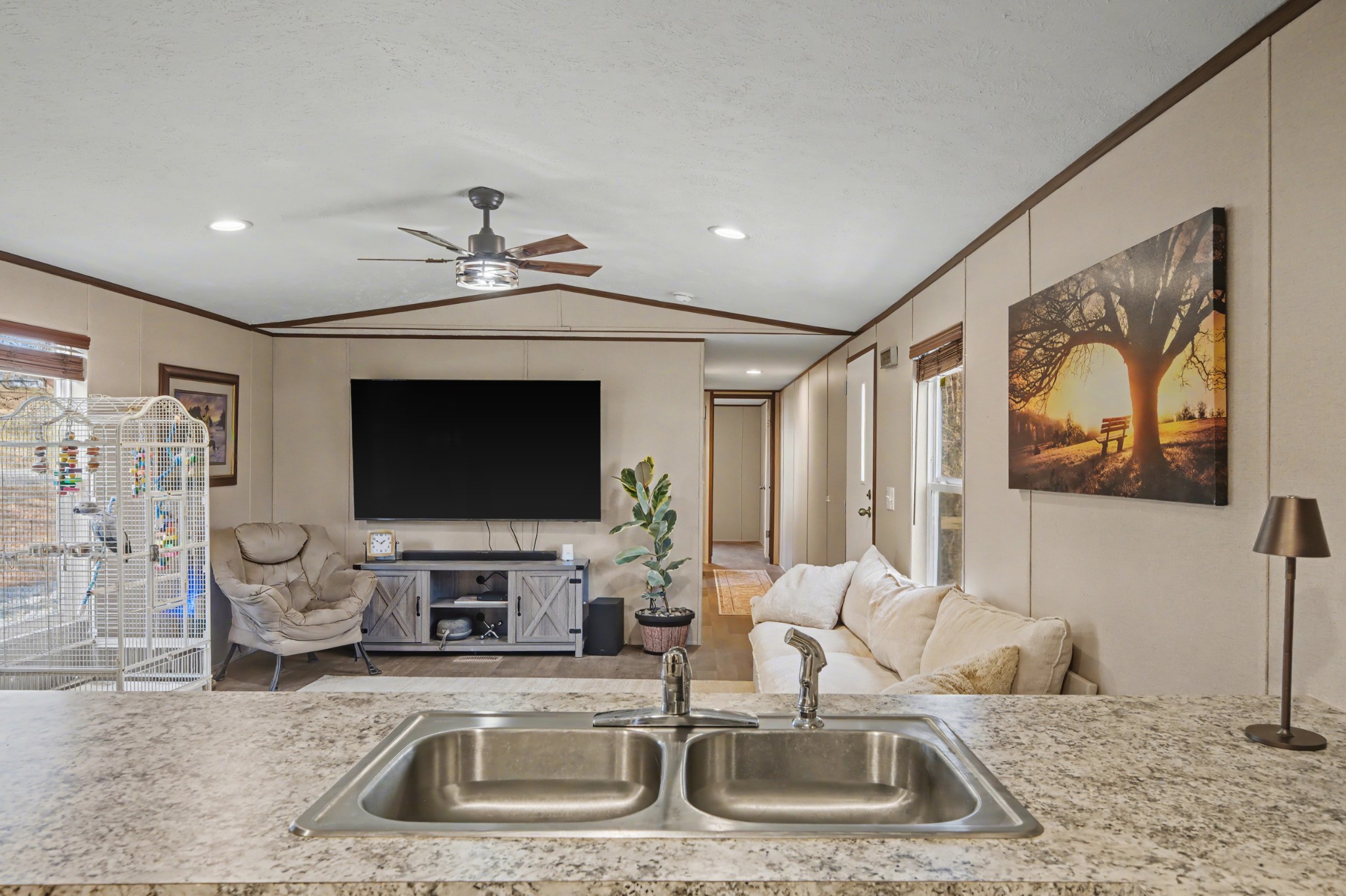 116 Lee Lane Big Rock, TN 37023 - Photo 17 of 34 a kitchen with stainless steel appliances a sink a microwave a refrigerator and cabinets