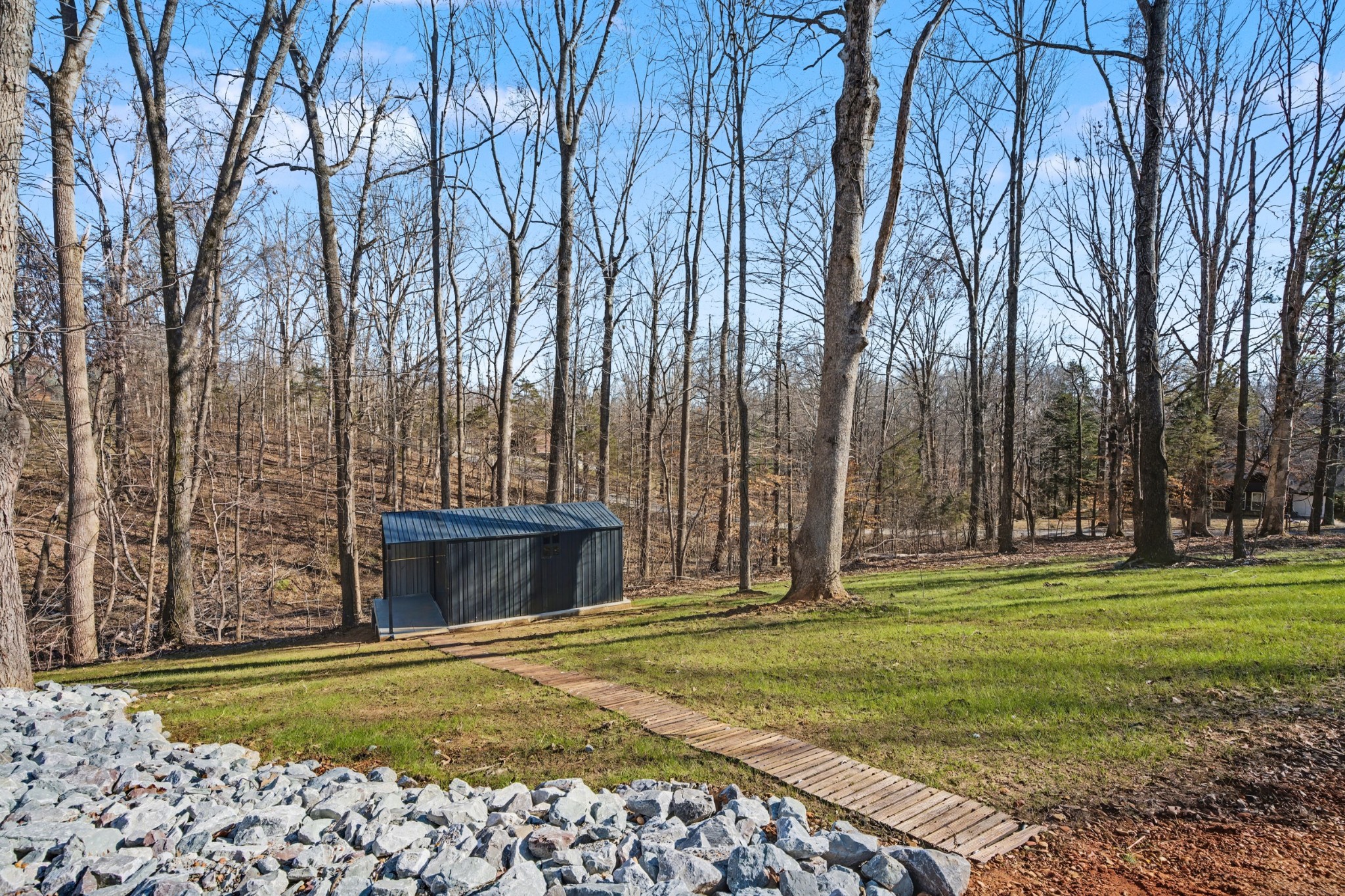 116 Lee Lane Big Rock, TN 37023 - Photo 18 of 34 a front view of a house with a yard