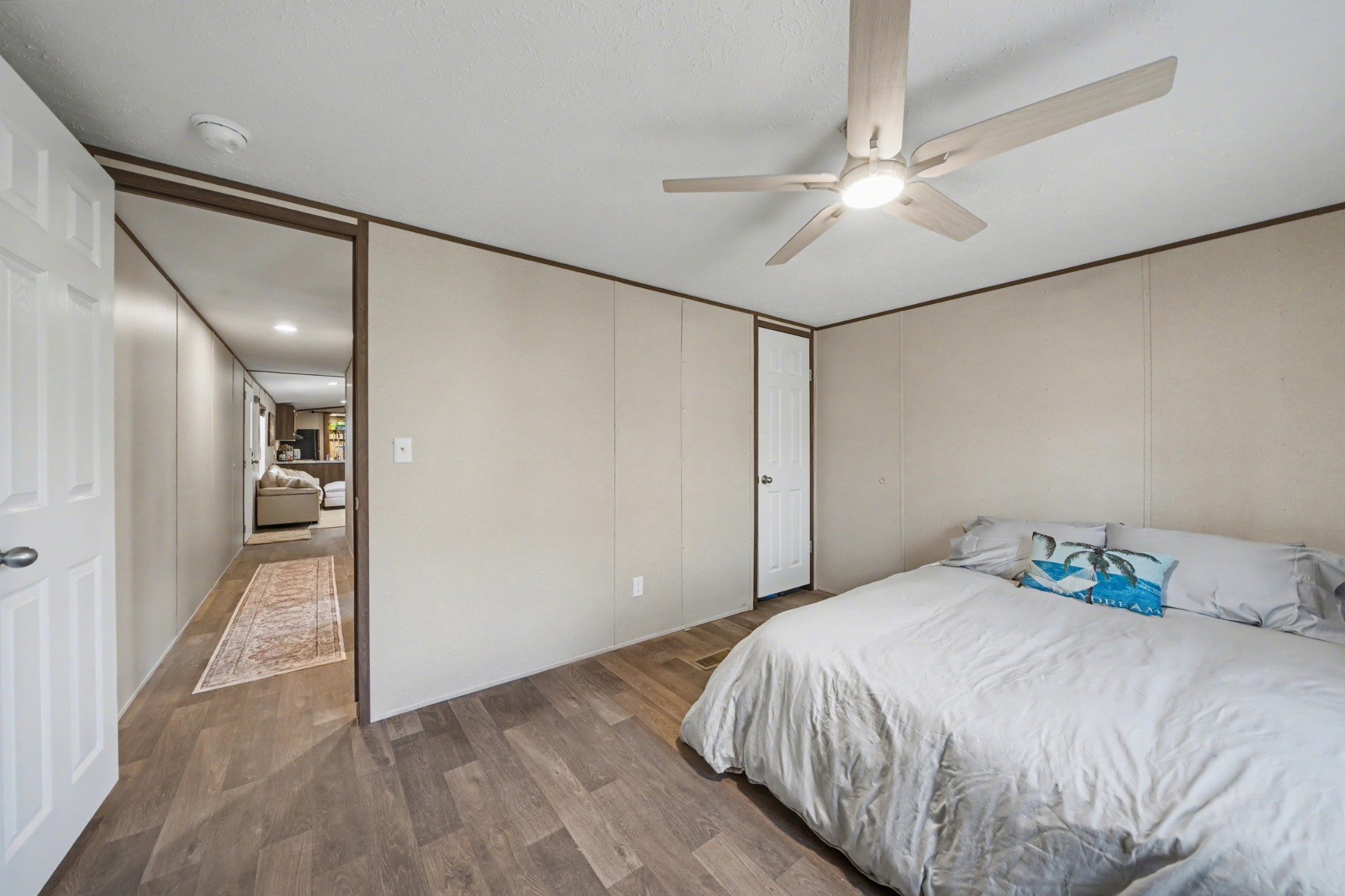 116 Lee Lane Big Rock, TN 37023 - Photo 22 of 34 a bedroom with a bed and a chandelier