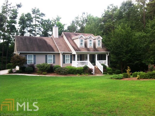 155 Nugget Road Carrollton, GA 30117 - Photo 1 of 1 a view of a house with a yard and sitting area