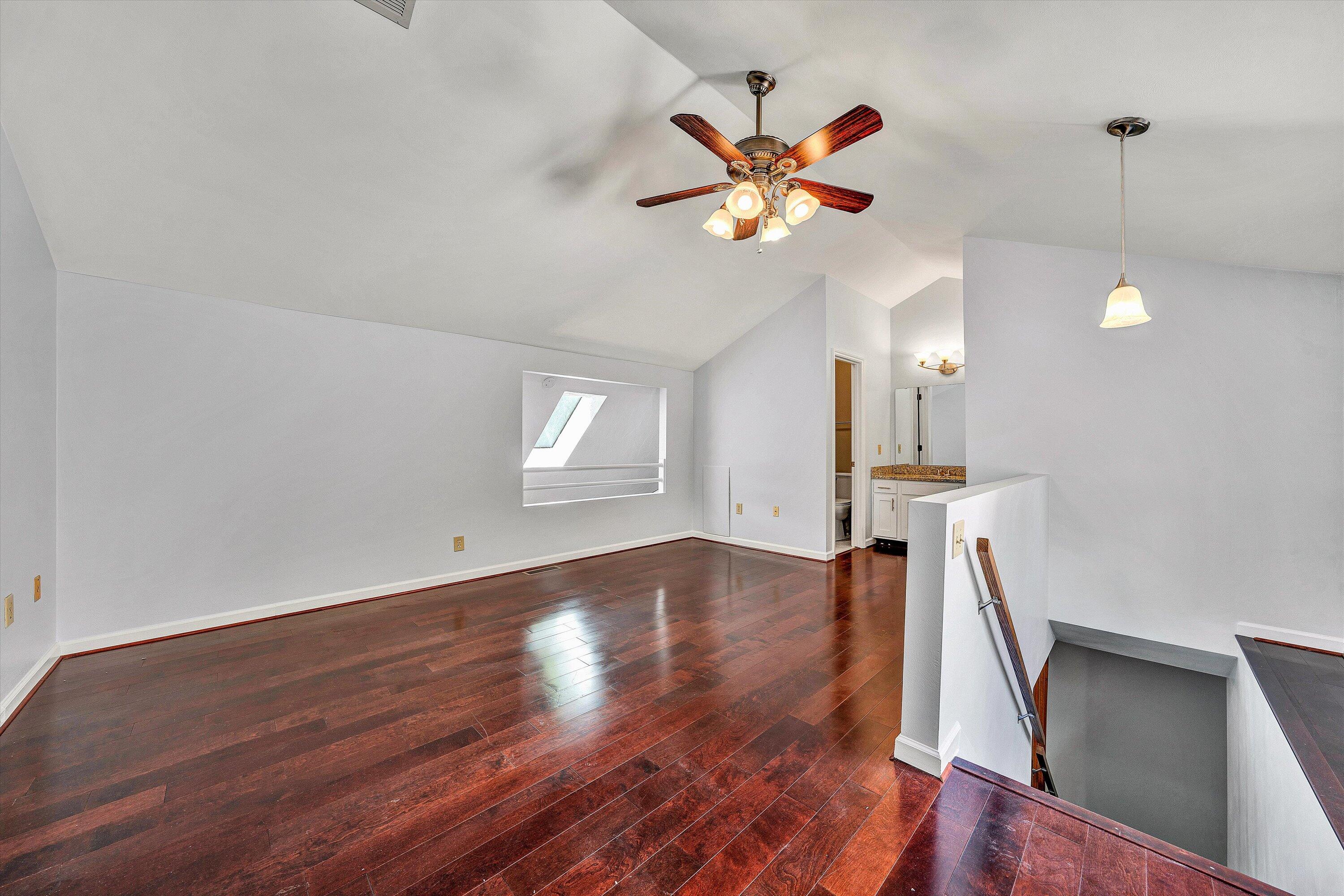 3349 Forest Ridge Road, Unit 3349 Roanoke, VA 24018 - Photo 14 of 20 a view of empty room with wooden floor and fan