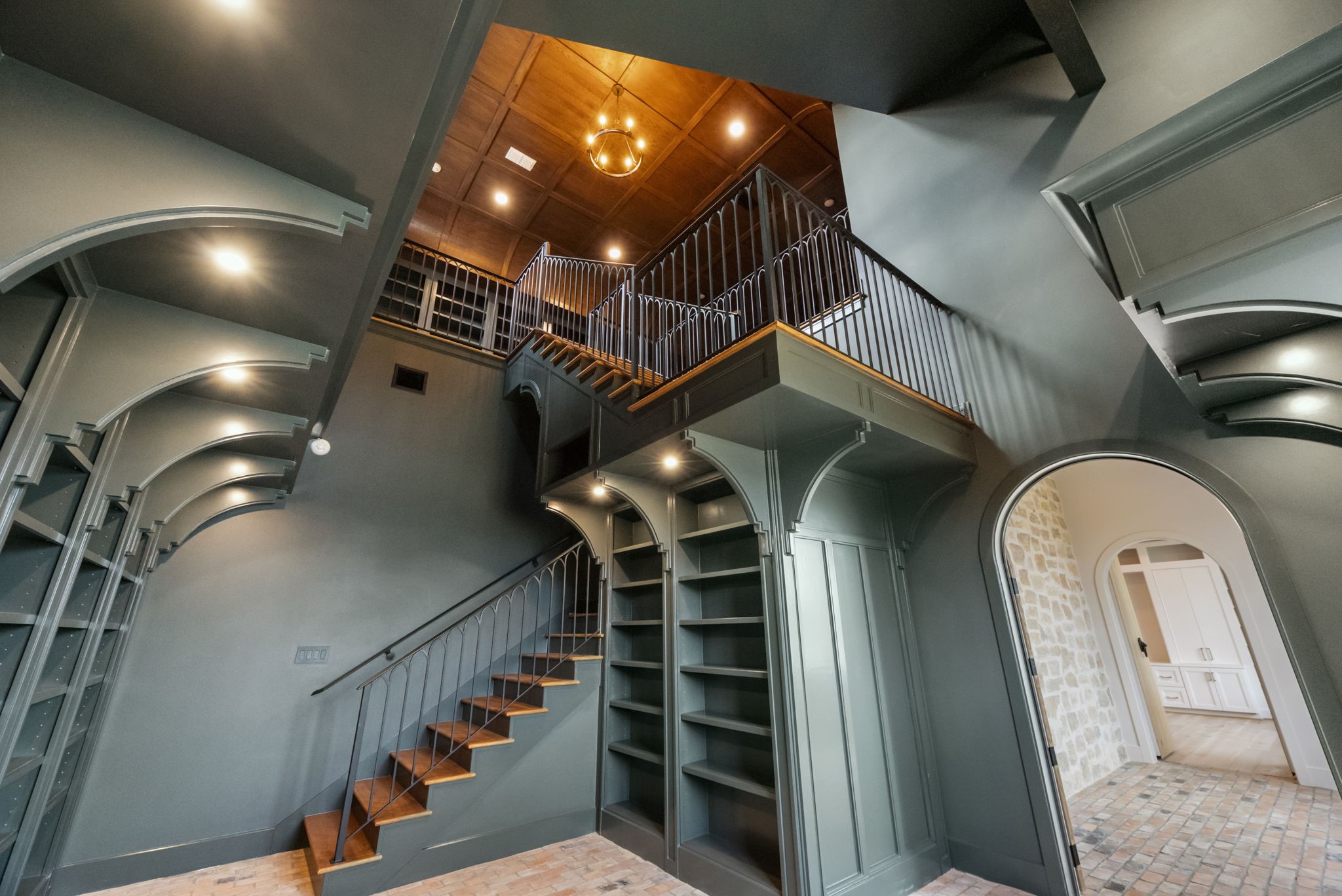 4233 Two Gun Way Katy, TX 77494 - Photo 38 of 47 Dramatic view of built-in and staircase and ceiling in library.