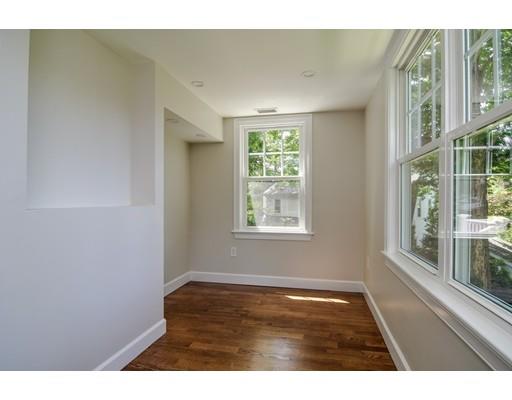 9 Framar Road Wellesley, MA 02481 - Photo 8 of 29 a view of an empty room with wooden floor and a window