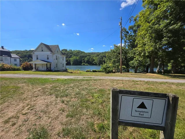 a view of a lake from a yard