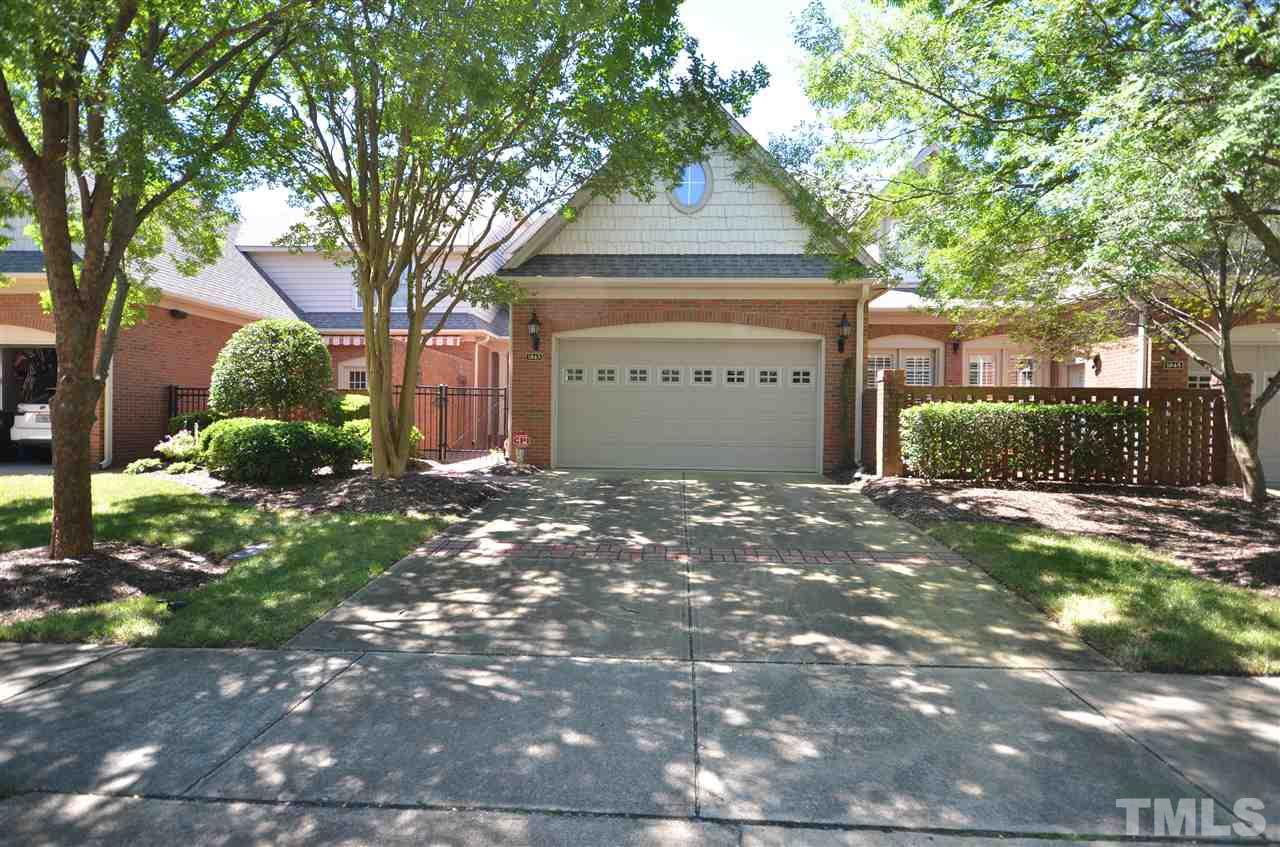 1843 Middlebrook Drive Raleigh, NC 27615 - Photo 2 of 13 a front view of a house with a yard and garage