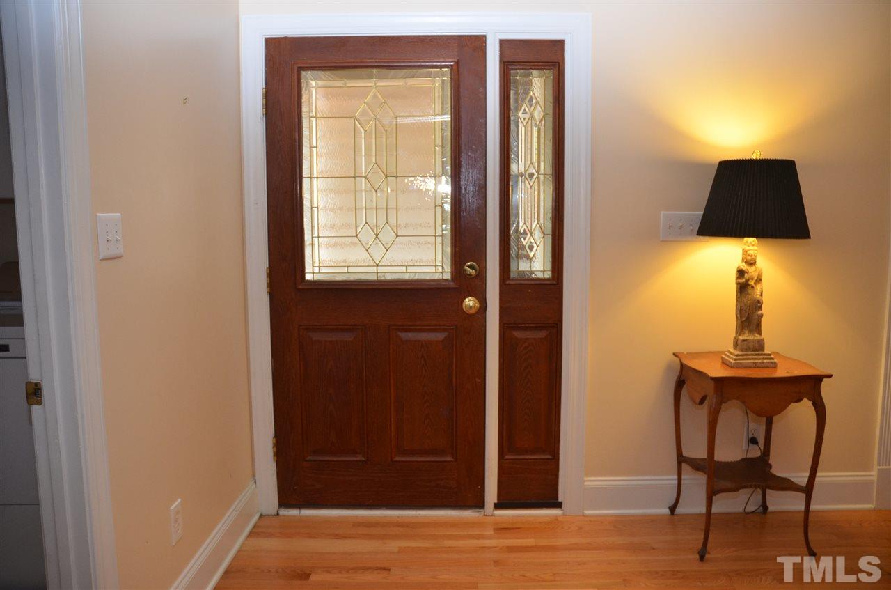 1843 Middlebrook Drive Raleigh, NC 27615 - Photo 4 of 13 a view of a bathroom with a sink mirror and window