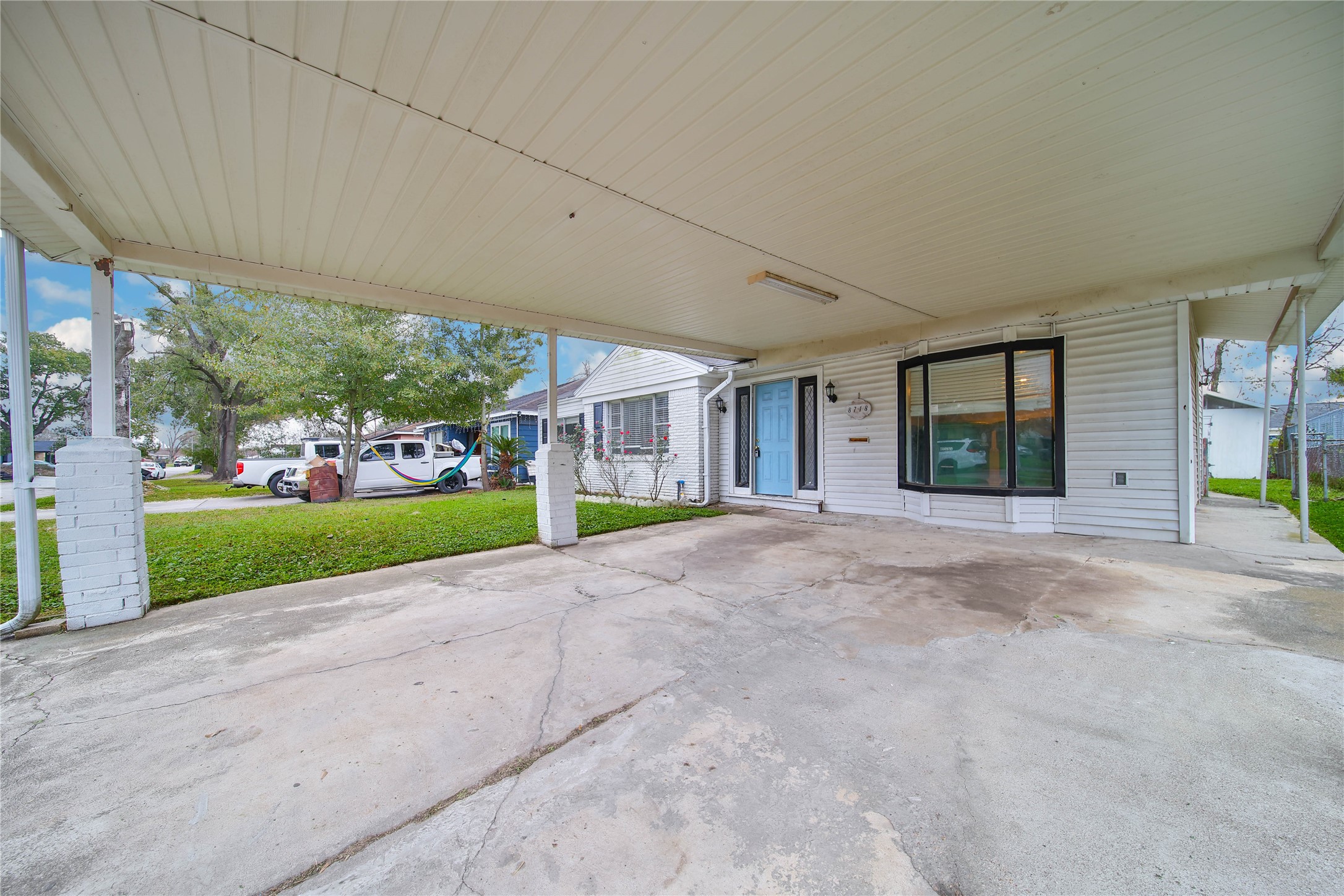 8718 Pattibob Street Houston, TX 77029 - Photo 2 of 14 a view of house with outdoor space and porch