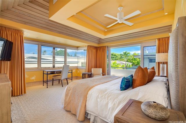 a bed room with a bed and a couch