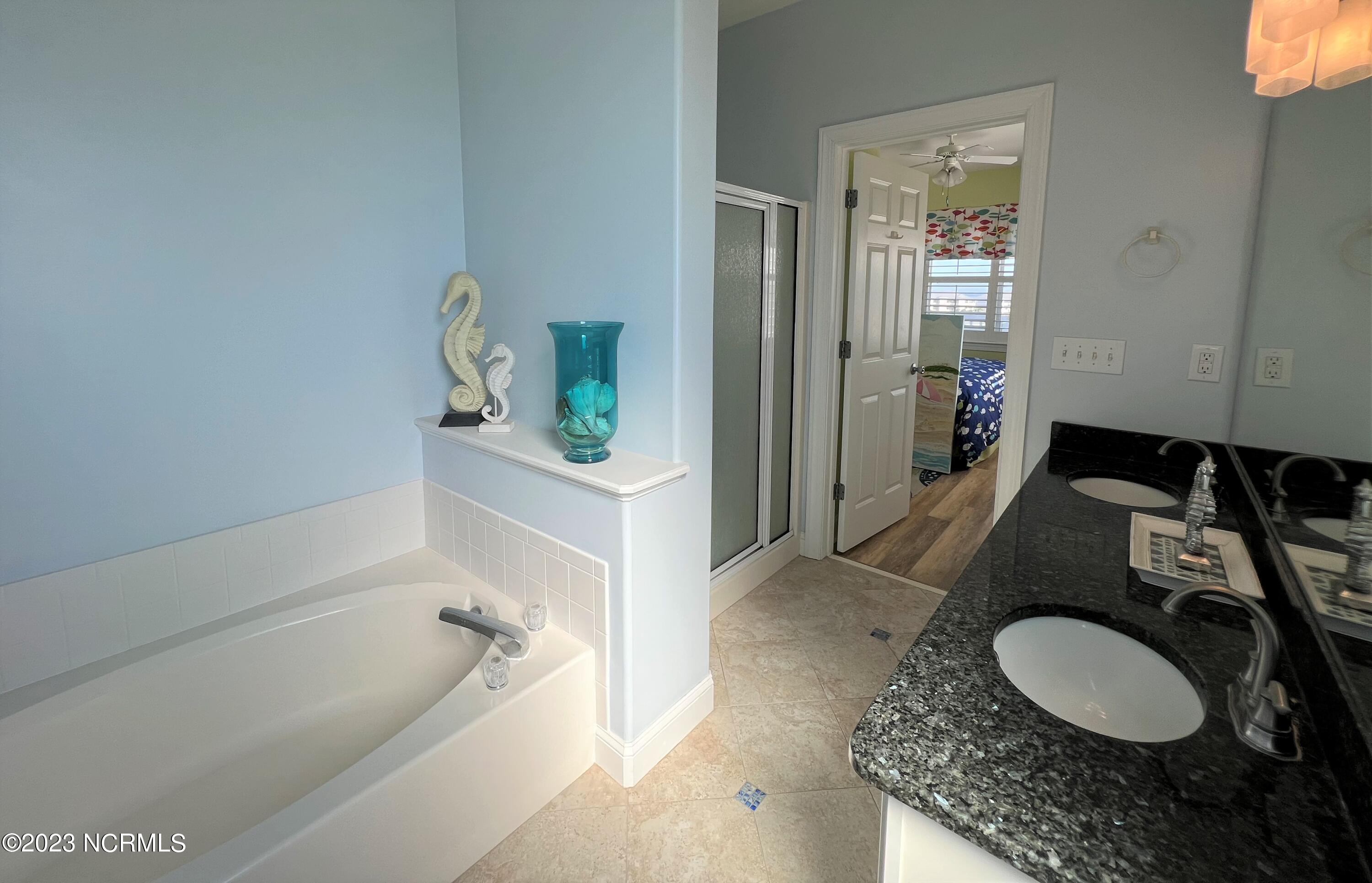 1701 Salter Path Road, Unit H 301 Indian Beach, NC 28512 - Photo 14 of 41 15 Master bathroom