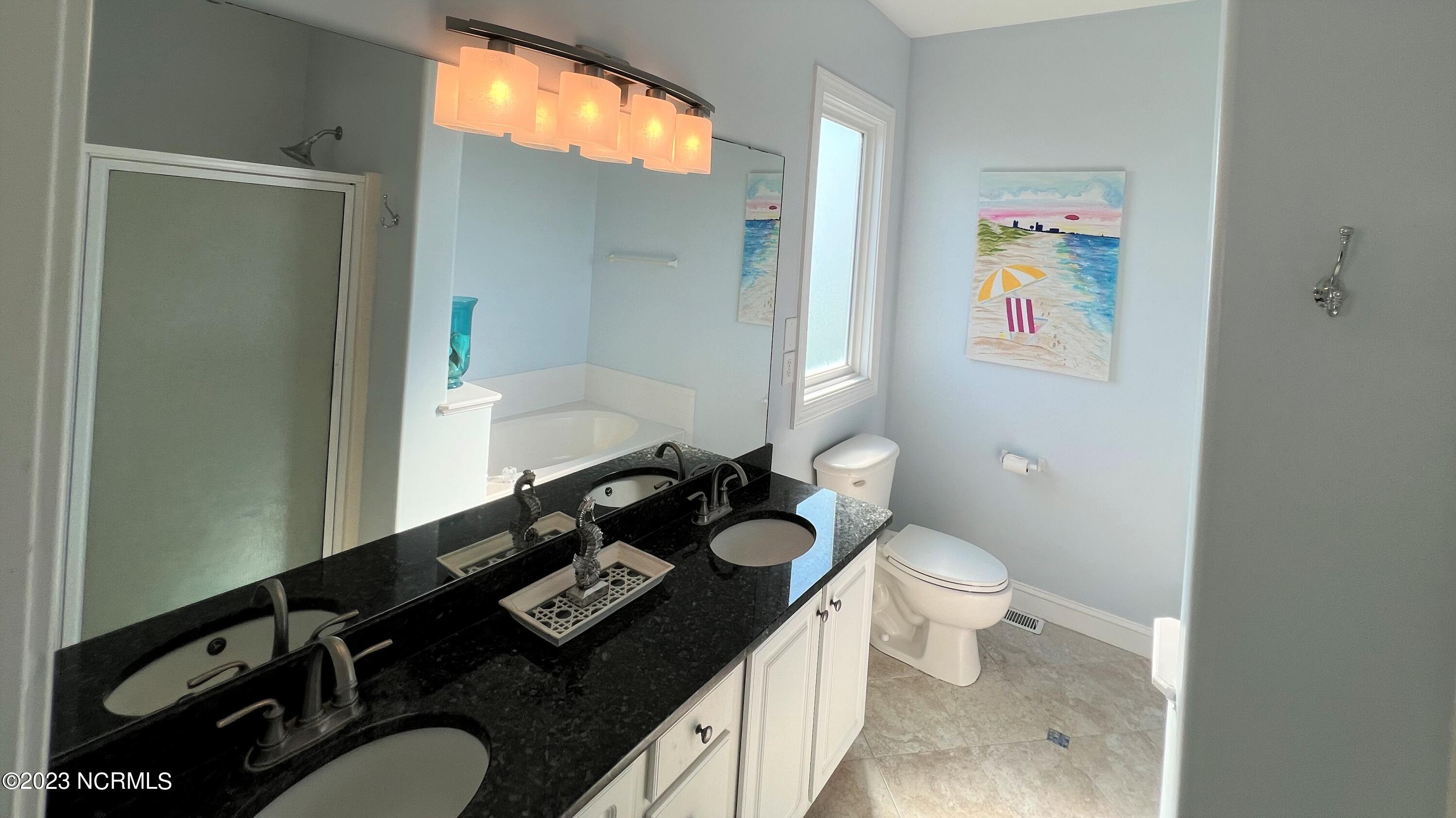 1701 Salter Path Road, Unit H 301 Indian Beach, NC 28512 - Photo 15 of 41 16 Master bathroom