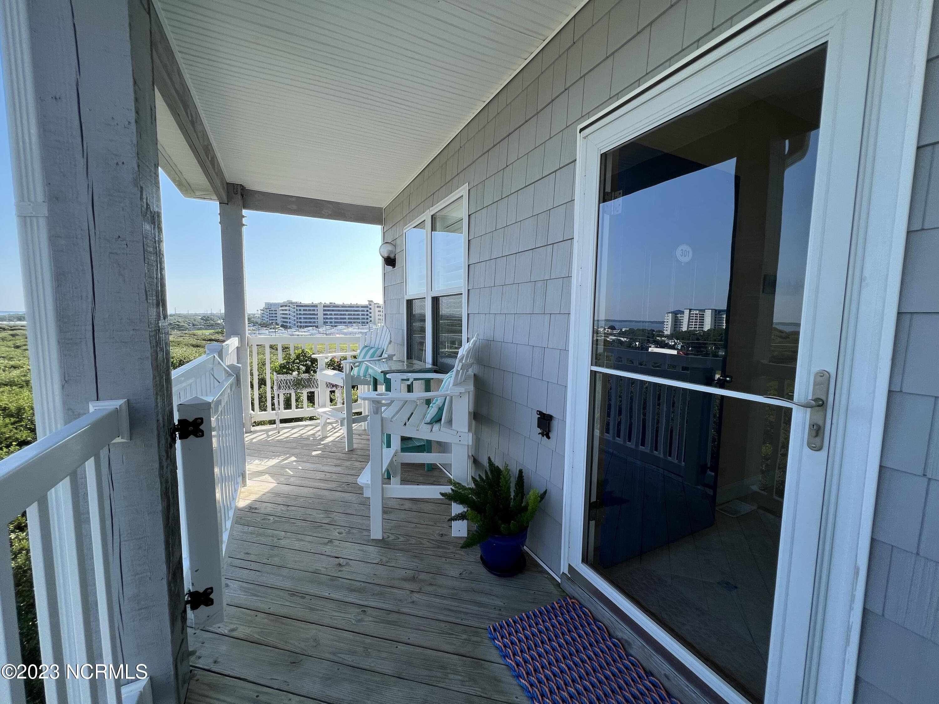 1701 Salter Path Road, Unit H 301 Indian Beach, NC 28512 - Photo 23 of 41 24 Sound side porch with views