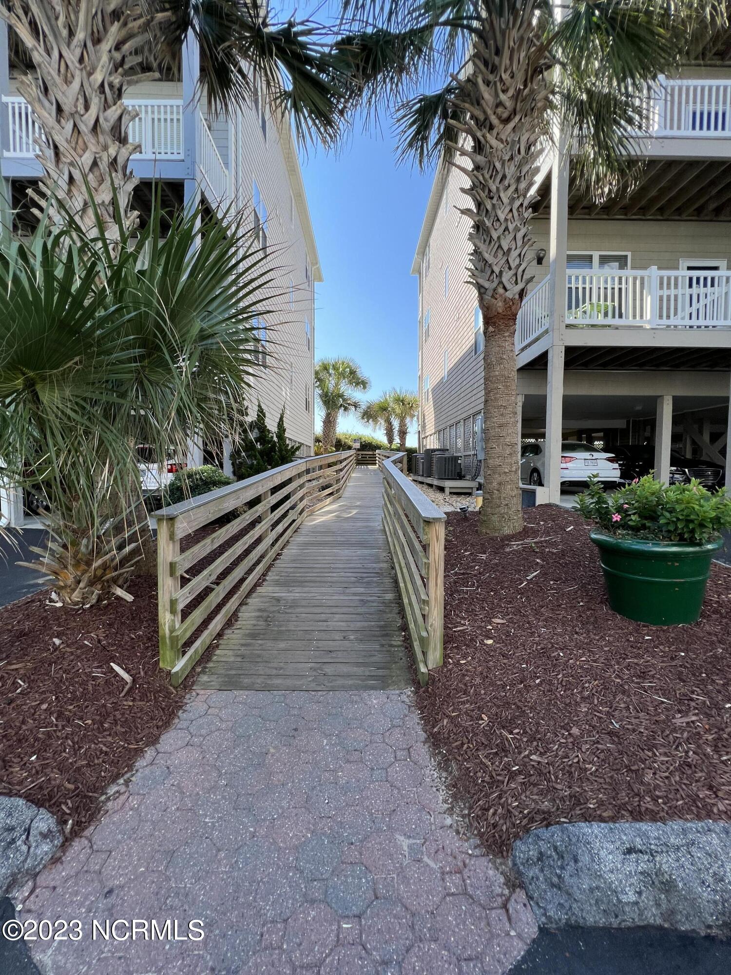 1701 Salter Path Road, Unit H 301 Indian Beach, NC 28512 - Photo 27 of 41 29 Walkway to pool & beach access