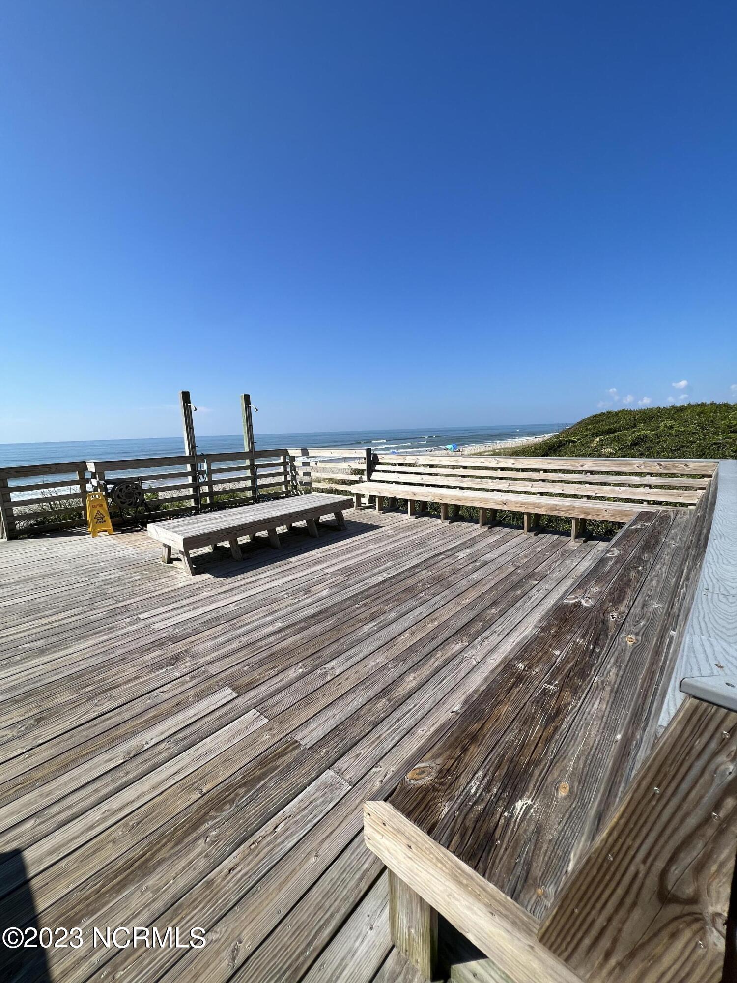 1701 Salter Path Road, Unit H 301 Indian Beach, NC 28512 - Photo 28 of 41 30 Ocean access deck with outside showe