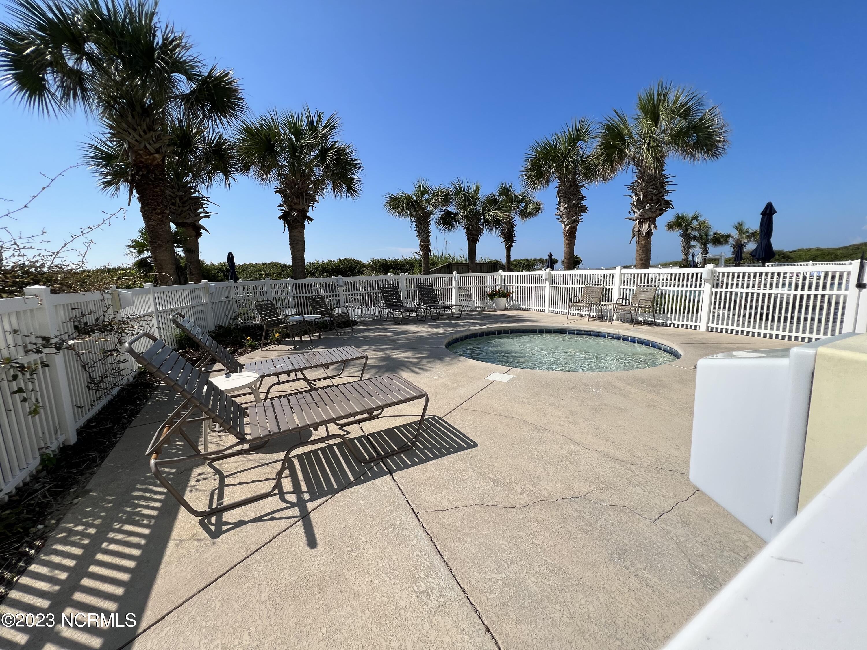 1701 Salter Path Road, Unit H 301 Indian Beach, NC 28512 - Photo 32 of 41 33 Community pool & hot tub on ocean s
