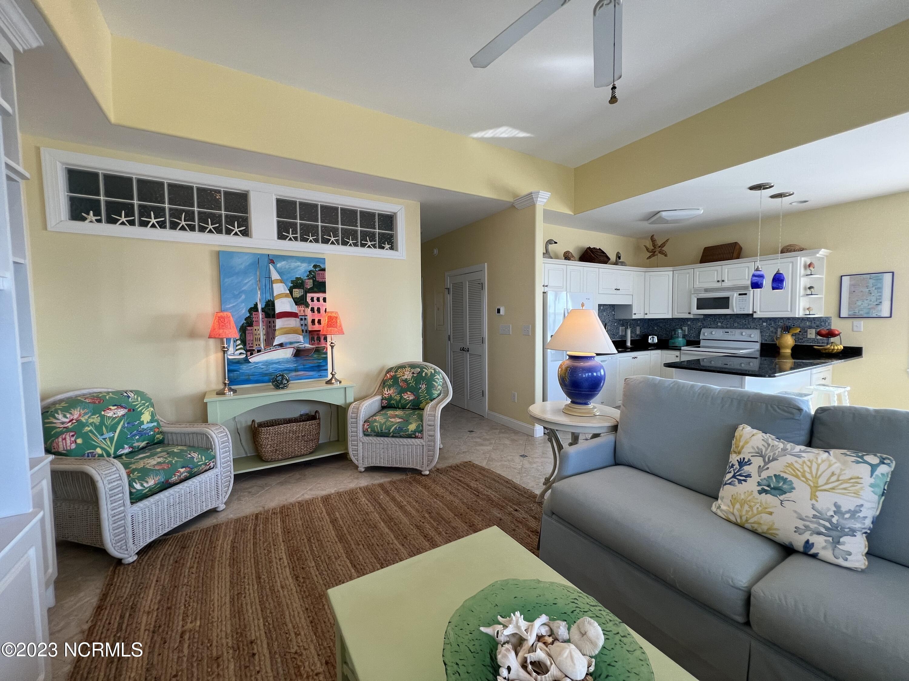 1701 Salter Path Road, Unit H 301 Indian Beach, NC 28512 - Photo 4 of 41 4 Living room to kitchen