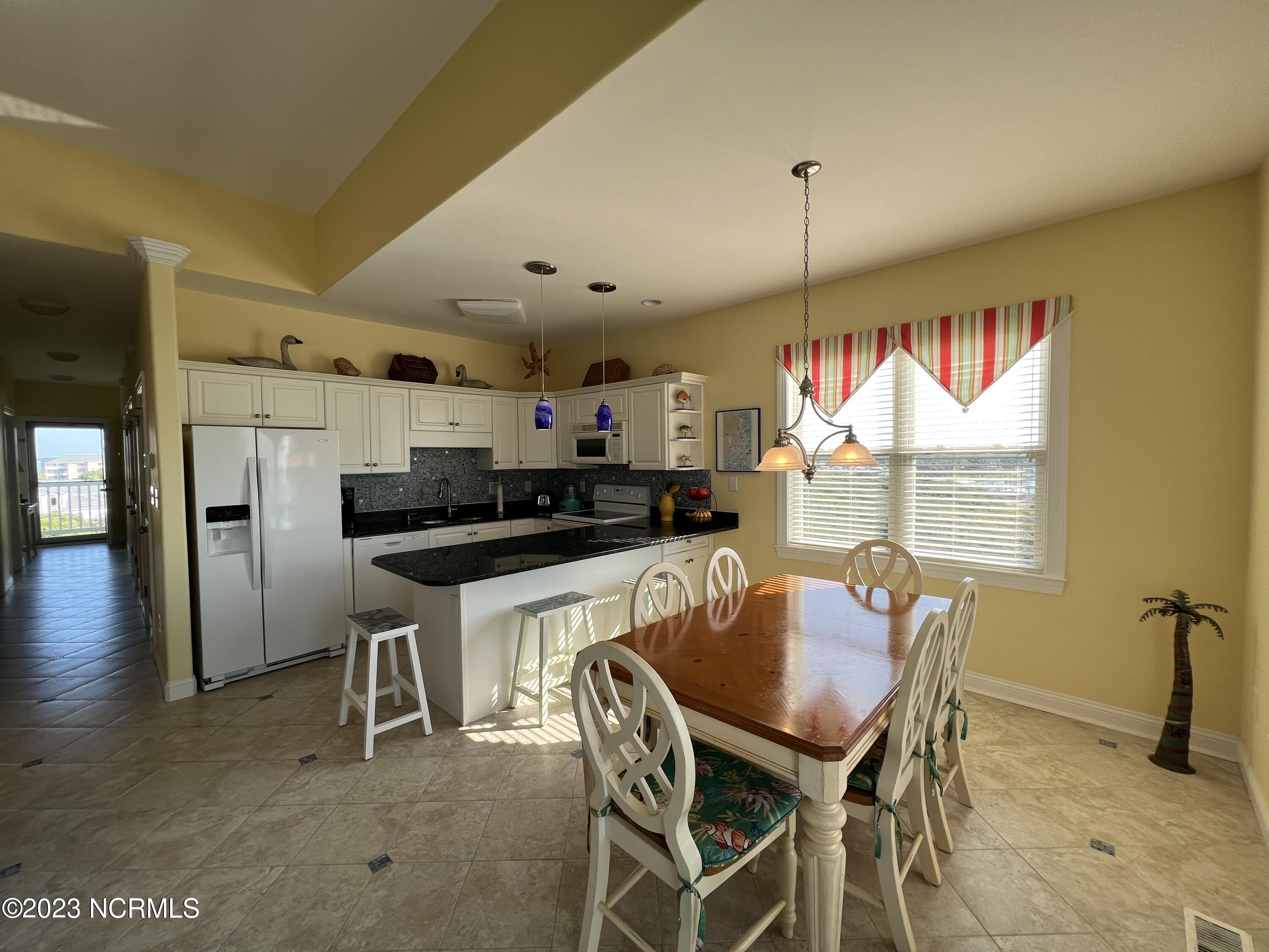 1701 Salter Path Road, Unit H 301 Indian Beach, NC 28512 - Photo 7 of 41 7 Kitchen & dining area