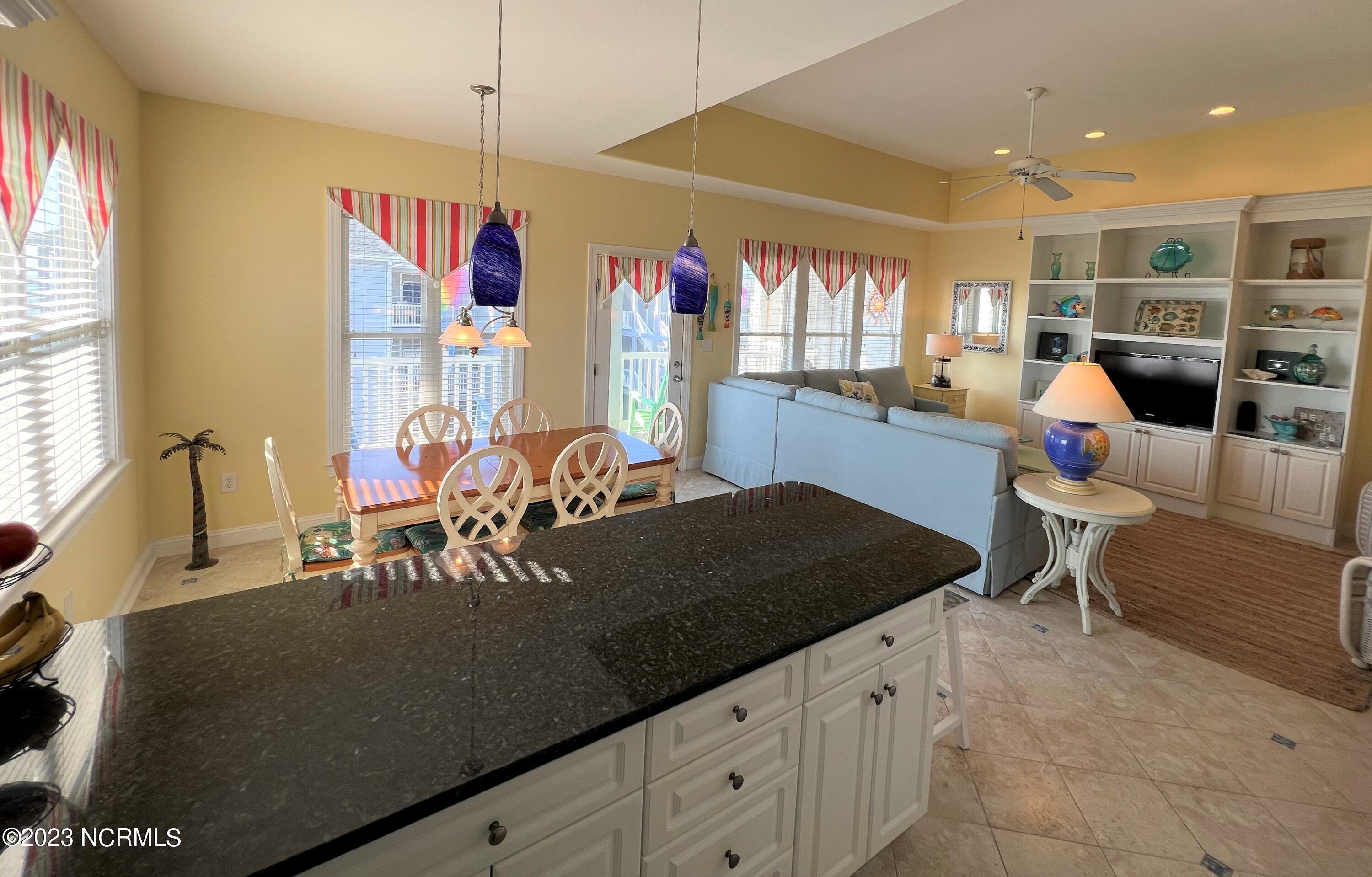 1701 Salter Path Road, Unit H 301 Indian Beach, NC 28512 - Photo 8 of 41 9 Kitchen & dining area into living ro