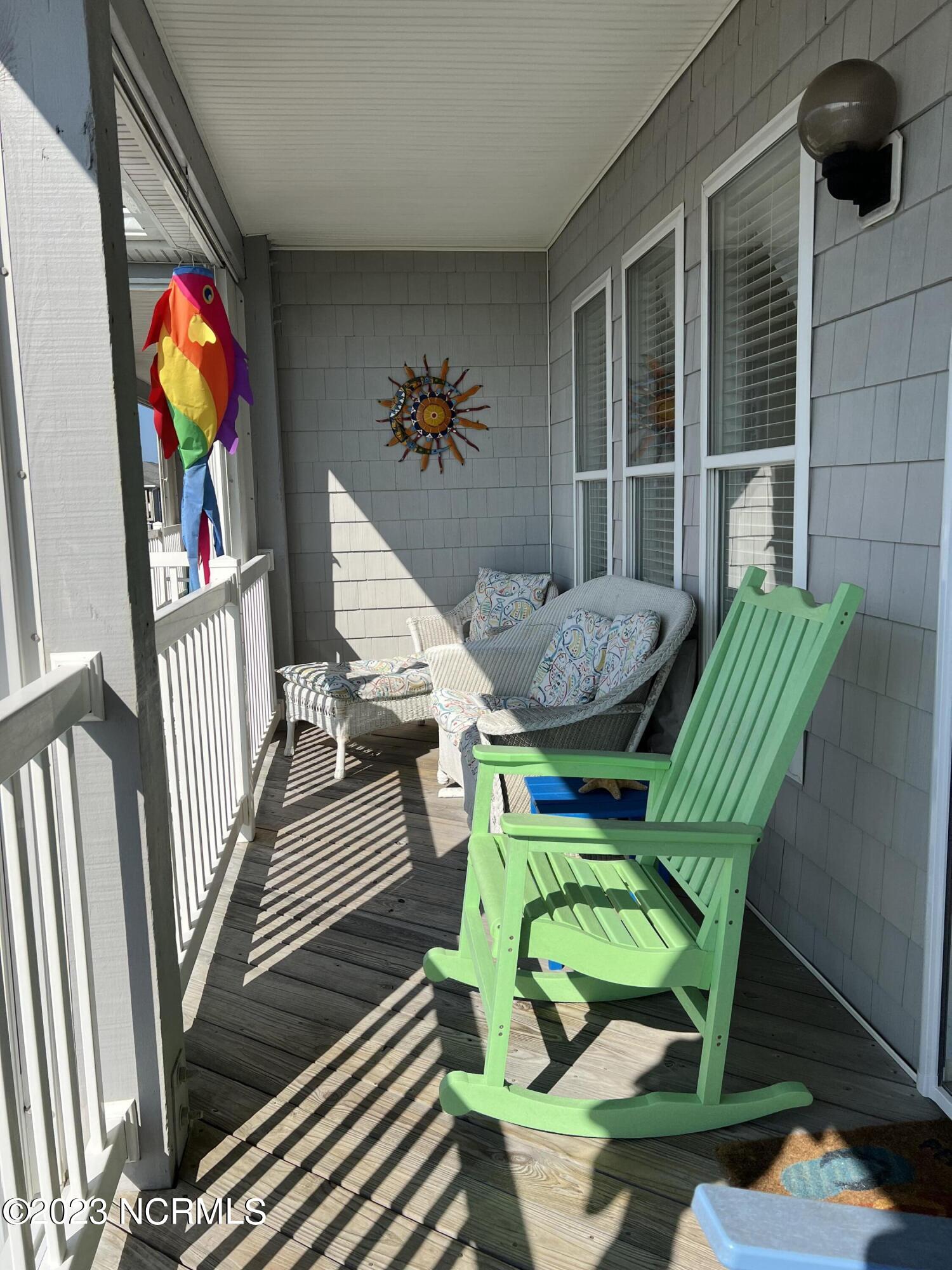 1701 Salter Path Road, Unit H 301 Indian Beach, NC 28512 - Photo 10 of 41 11 Porch with ocean VIEWS