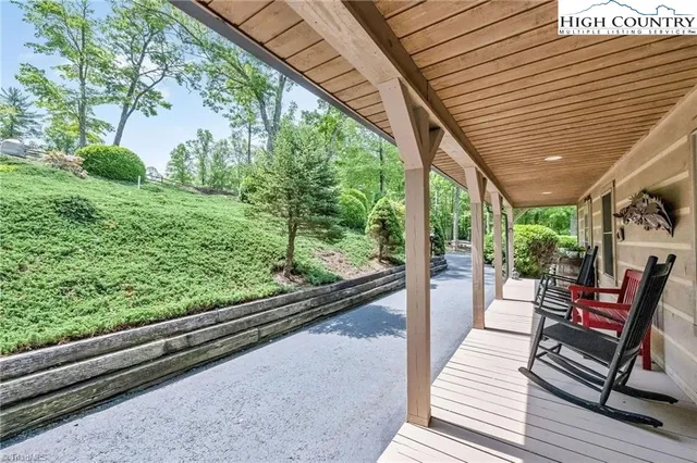 a view of a two chairs in the balcony