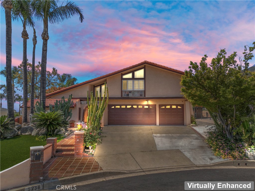 5234 Della Avenue Rancho Cucamonga, CA 91701 - Photo 1 of 1 a view of a house with a yard