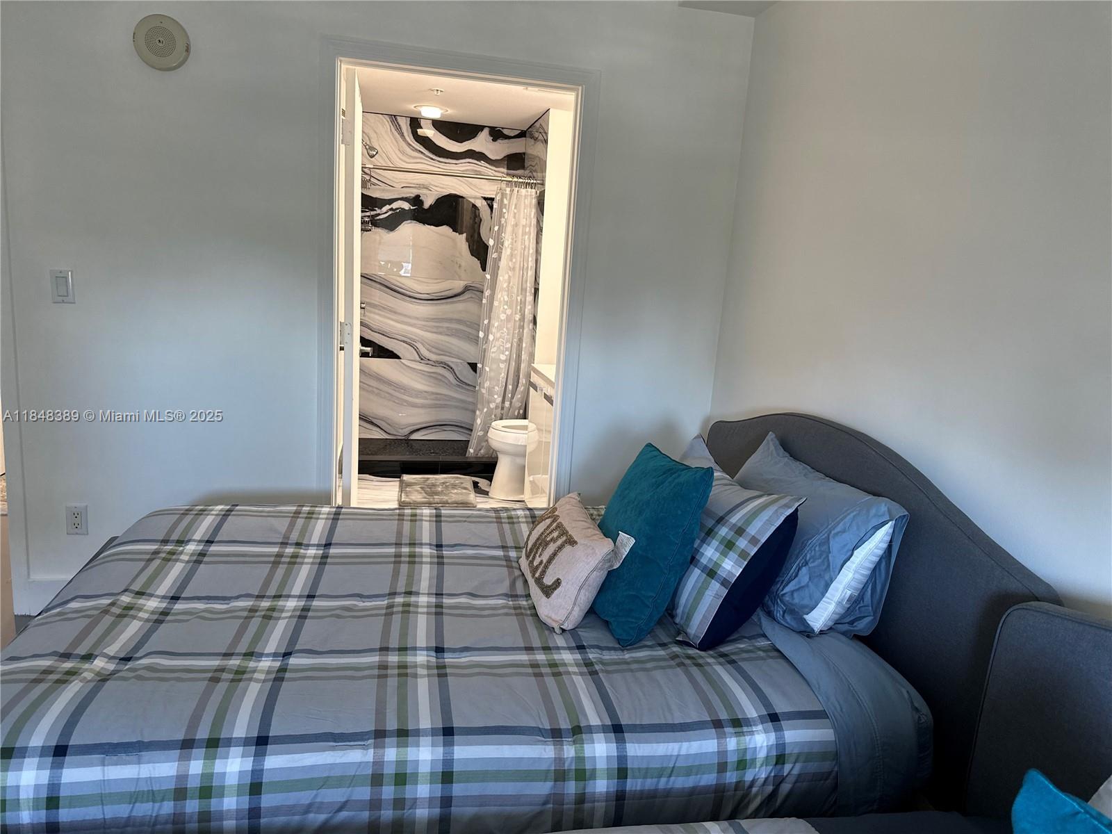 601 Northeast 36th Street, Unit 1009 Miami, FL 33137 - Photo 14 of 19 a living room with furniture