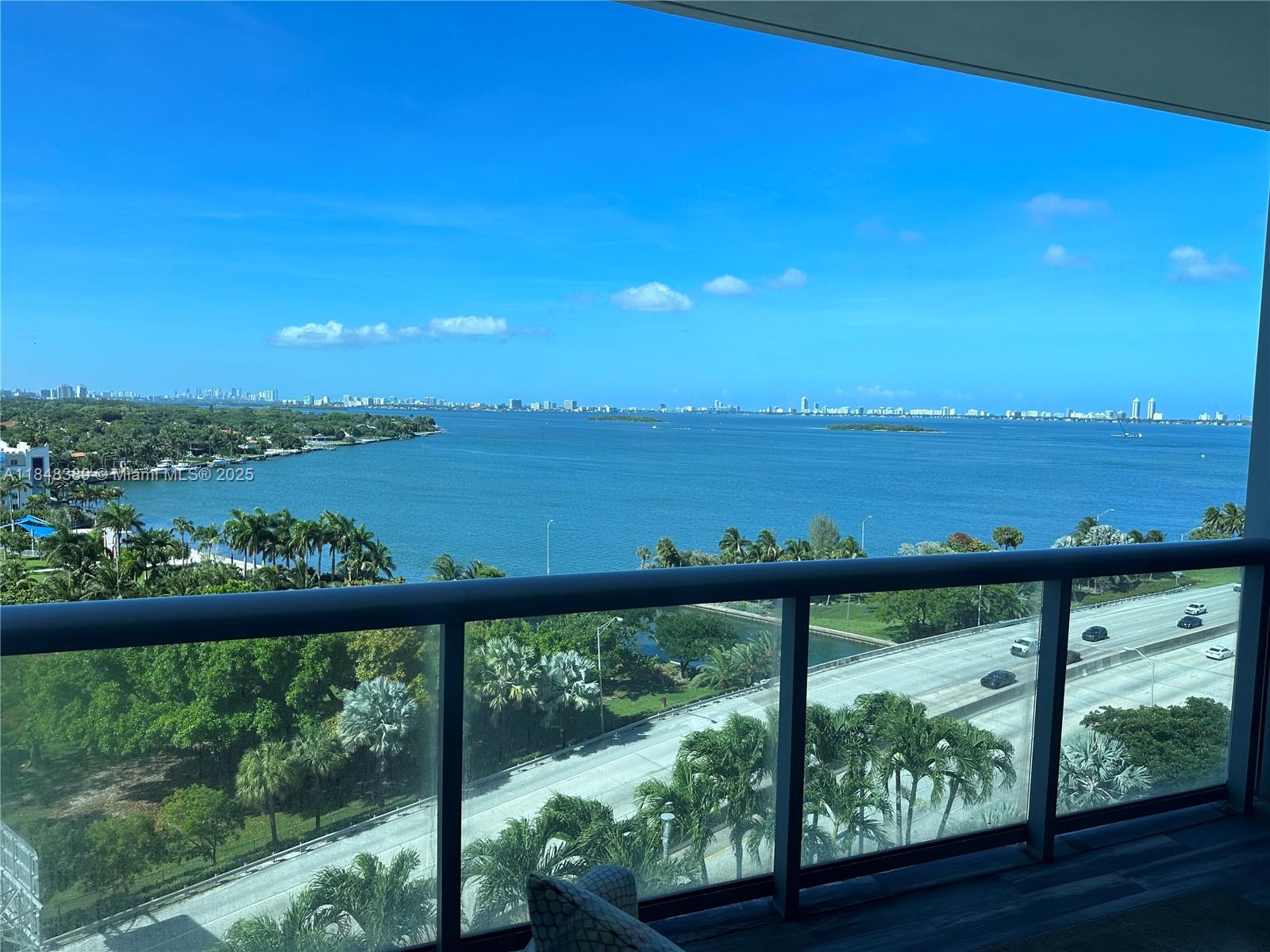 601 Northeast 36th Street, Unit 1009 Miami, FL 33137 - Photo 4 of 19 a view of an ocean from a balcony