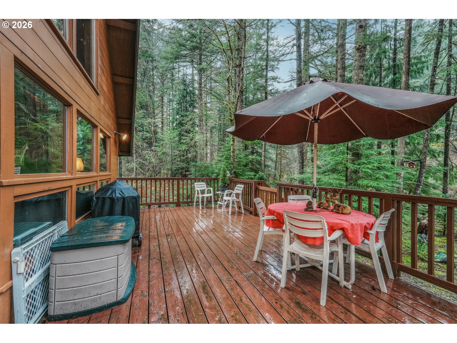 15202 Washougal River Road Washougal, WA 98671 - Photo 13 of 32 a view of balcony with wooden floor and outdoor seating