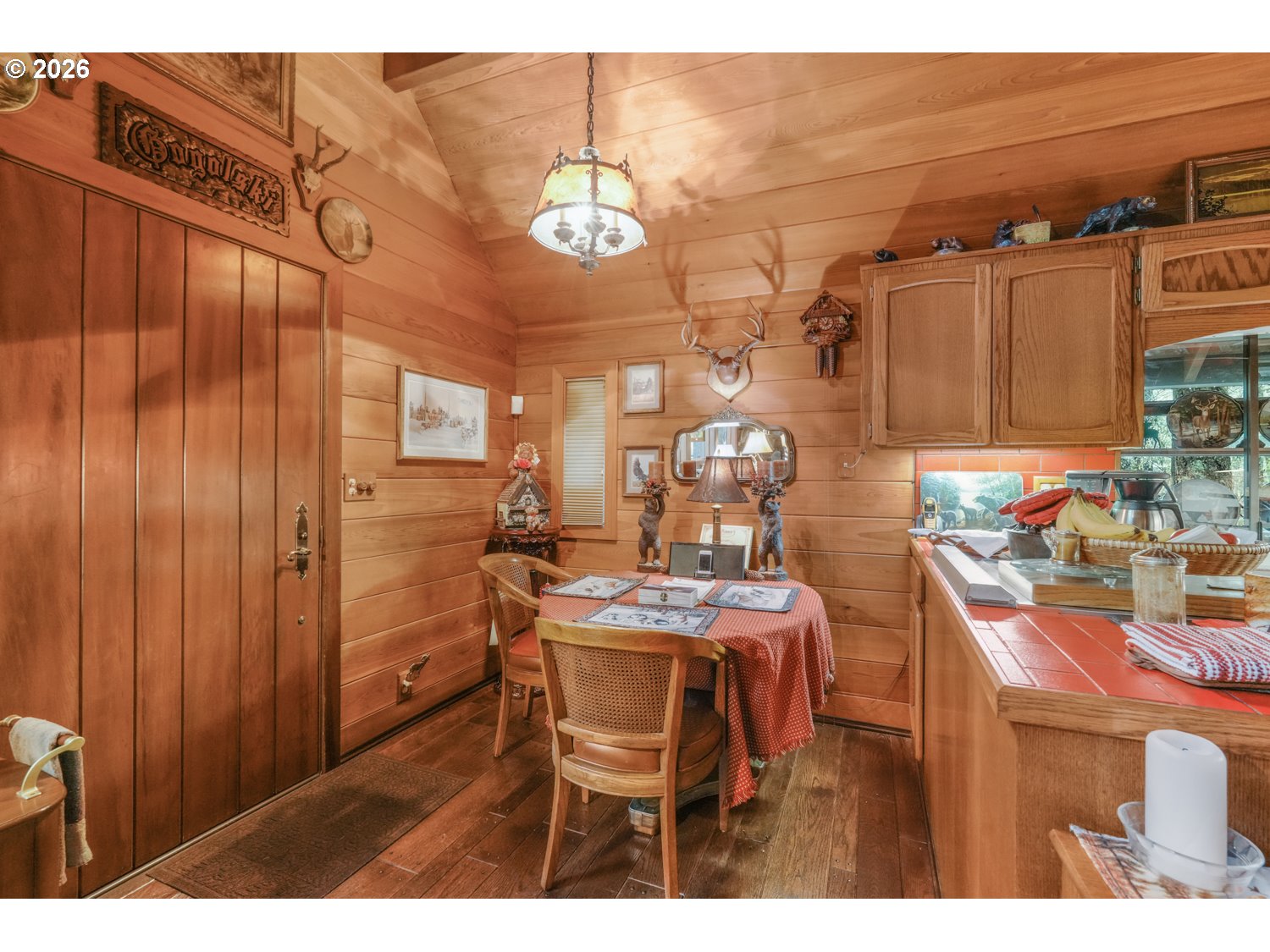 15202 Washougal River Road Washougal, WA 98671 - Photo 17 of 32 a view of a dining room with furniture and chandelier