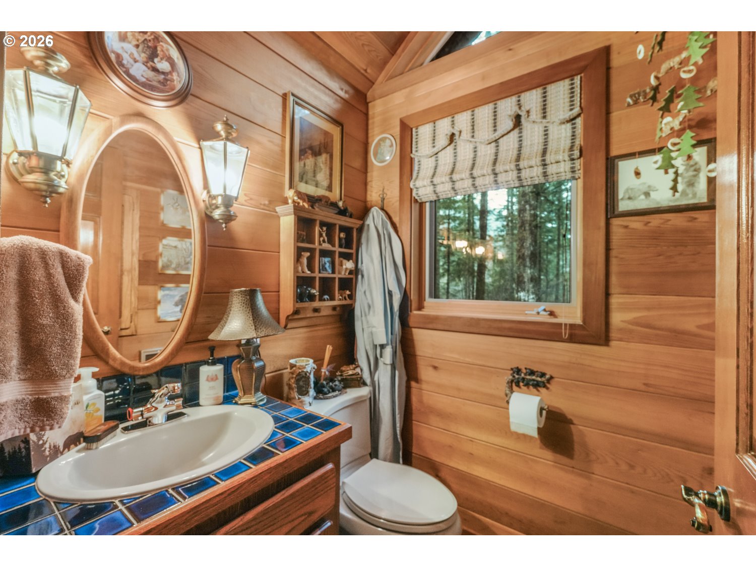 15202 Washougal River Road Washougal, WA 98671 - Photo 24 of 32 a bathroom with a sink a mirror and a vanity
