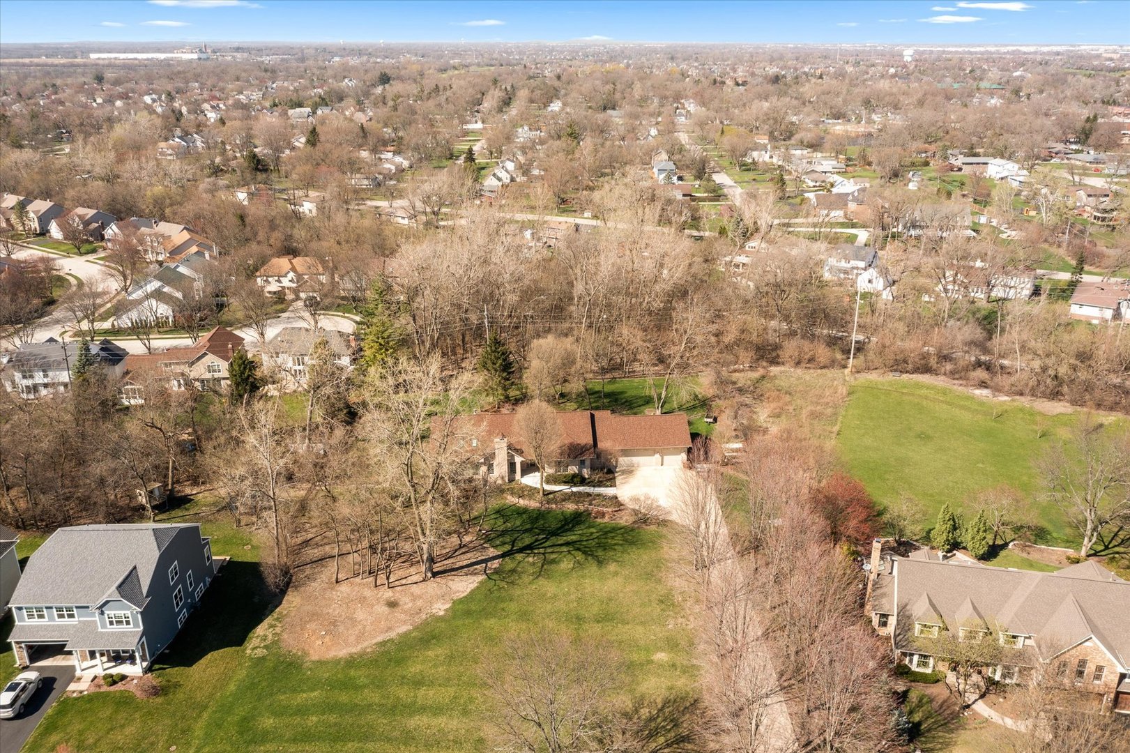 26W480 Churchill Road Winfield, IL 60190 - Photo 4 of 4 an aerial view of residential houses with outdoor space