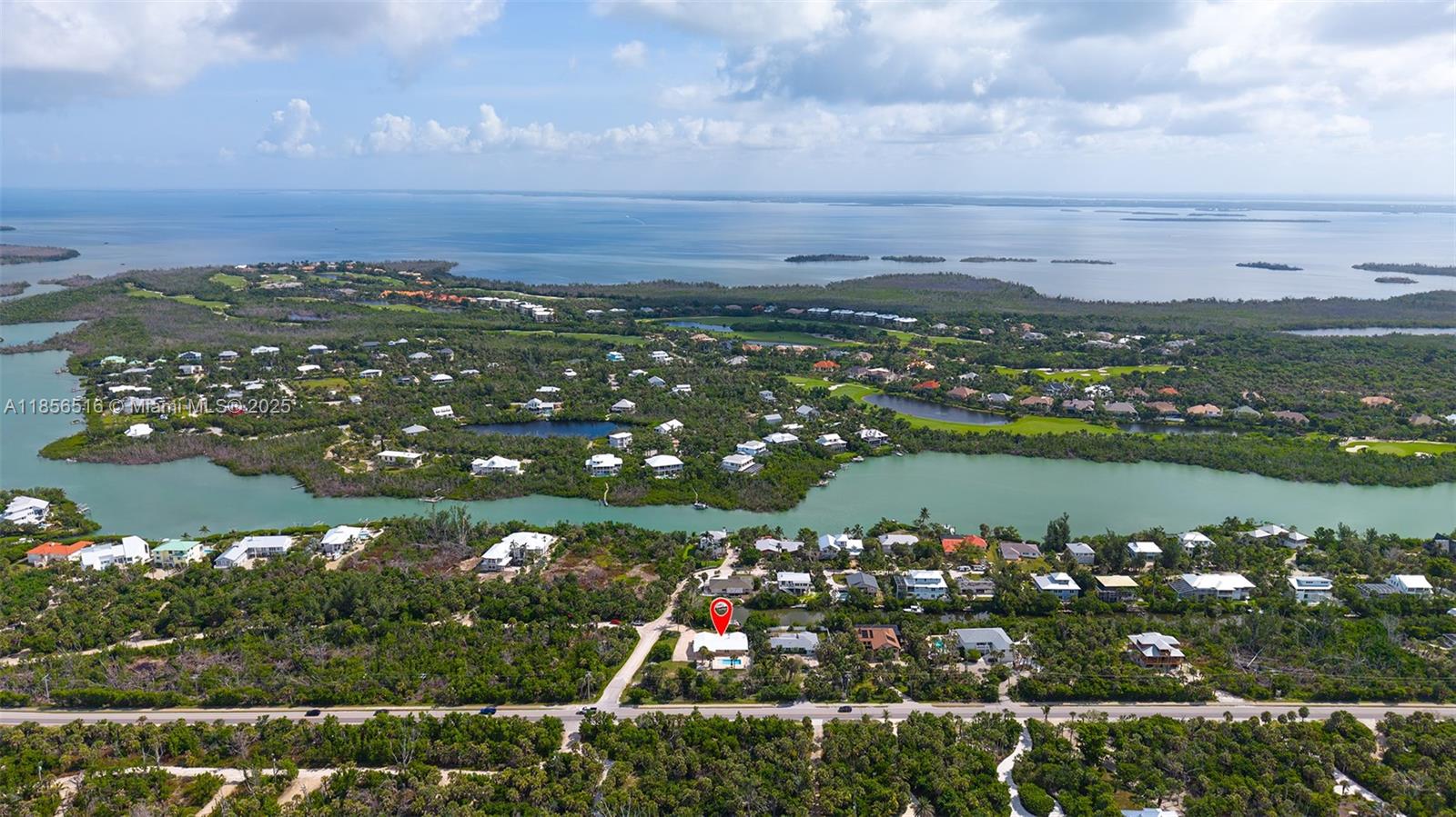 5885 Pine Tree Drive Sanibel, FL 33957 - Photo 51 of 56 a view of lake and city