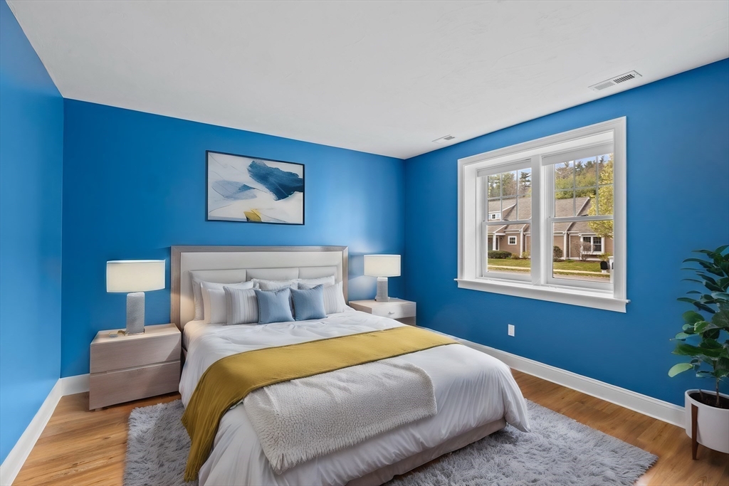 10 Mariner's Drive, Unit 10 Marshfield, MA 02050 - Photo 11 of 25 a bedroom with bed and window