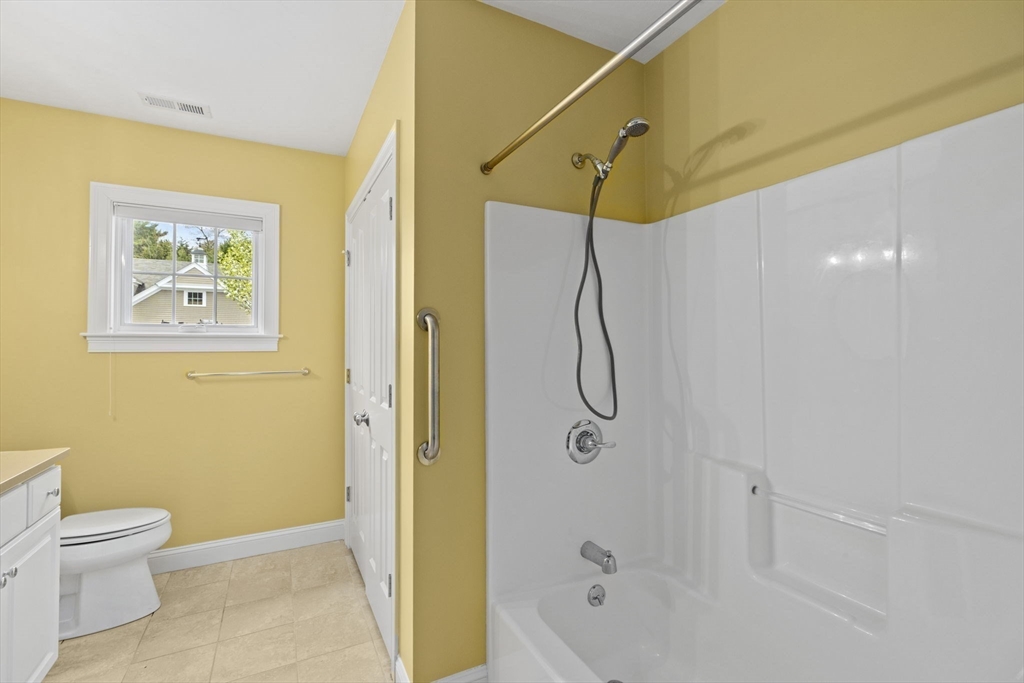 10 Mariner's Drive, Unit 10 Marshfield, MA 02050 - Photo 13 of 25 a bathroom with a shower a toilet and sink