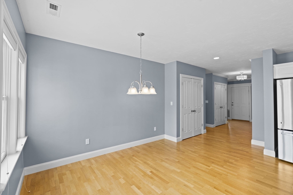 10 Mariner's Drive, Unit 10 Marshfield, MA 02050 - Photo 20 of 25 a view of a big room with windows and cabinet