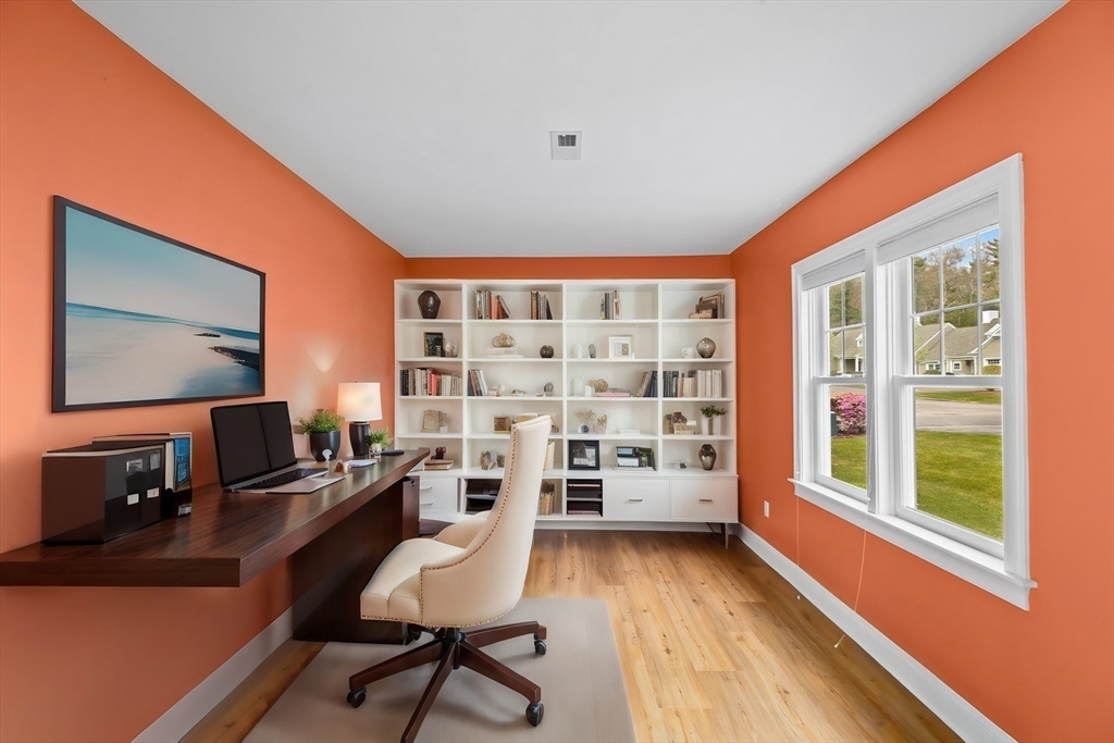 10 Mariner's Drive, Unit 10 Marshfield, MA 02050 - Photo 6 of 25 a view of a livingroom with furniture and wooden floor