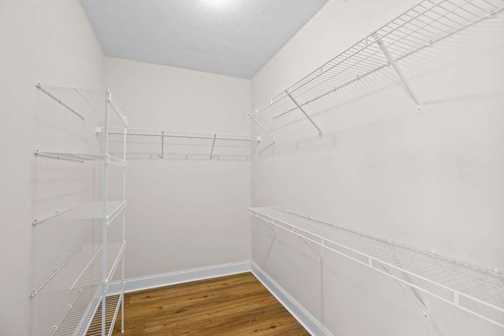 10 Mariner's Drive, Unit 10 Marshfield, MA 02050 - Photo 10 of 25 a view of a room with racks on the wall