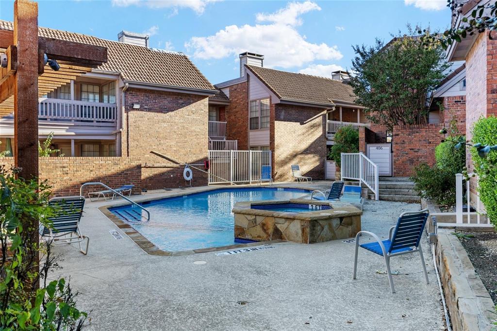 18240 Midway Road, Unit 1204 Dallas, TX 75287 - Photo 5 of 27 a view of a house with backyard sitting area and fire pit