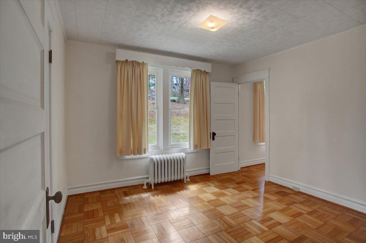 14625 Hilltop Road Cascade, MD 21719 - Photo 23 of 49 an empty room with windows