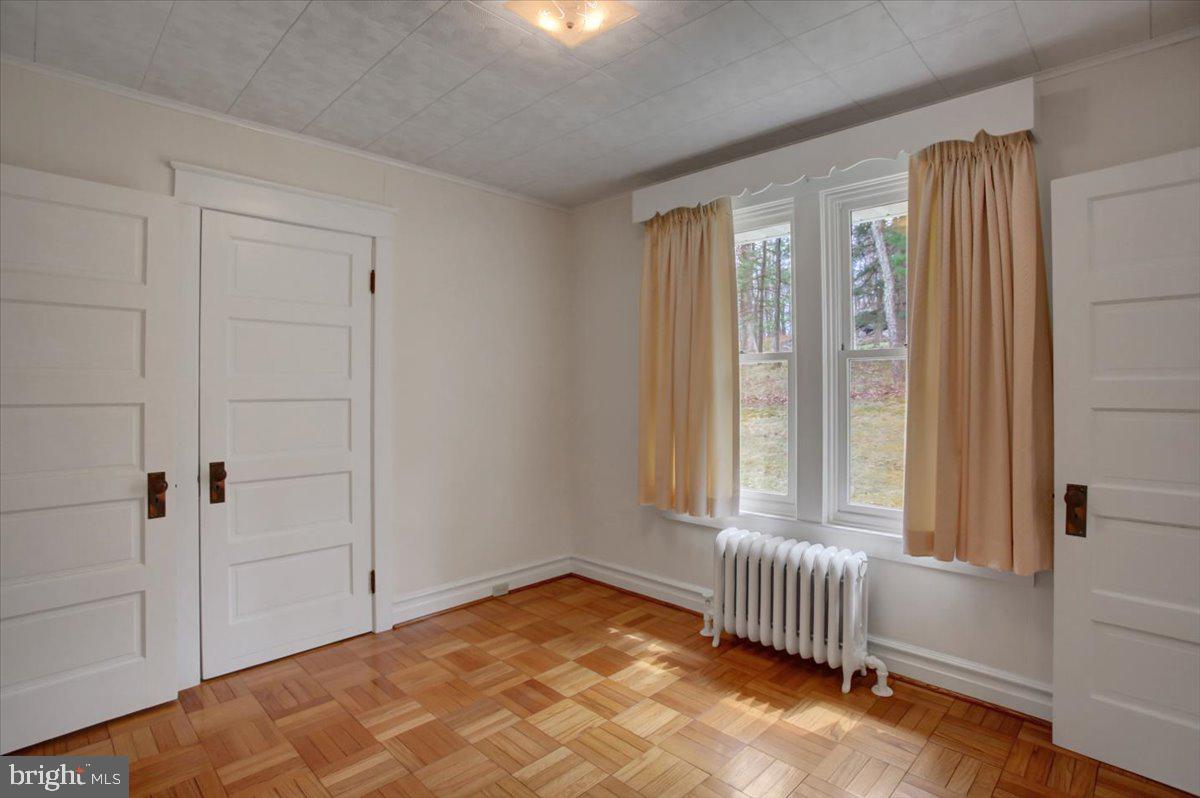 14625 Hilltop Road Cascade, MD 21719 - Photo 24 of 49 a view of empty room with wooden floor