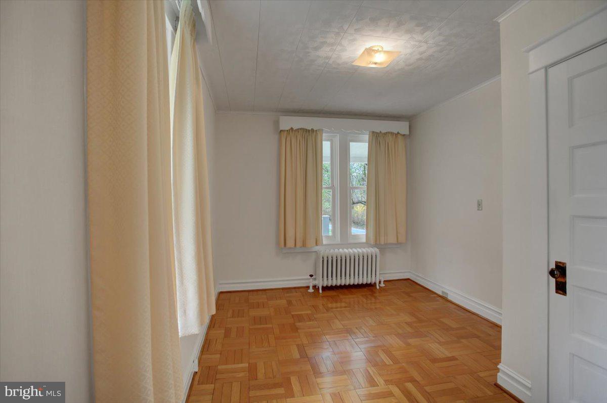 14625 Hilltop Road Cascade, MD 21719 - Photo 25 of 49 an empty room with windows