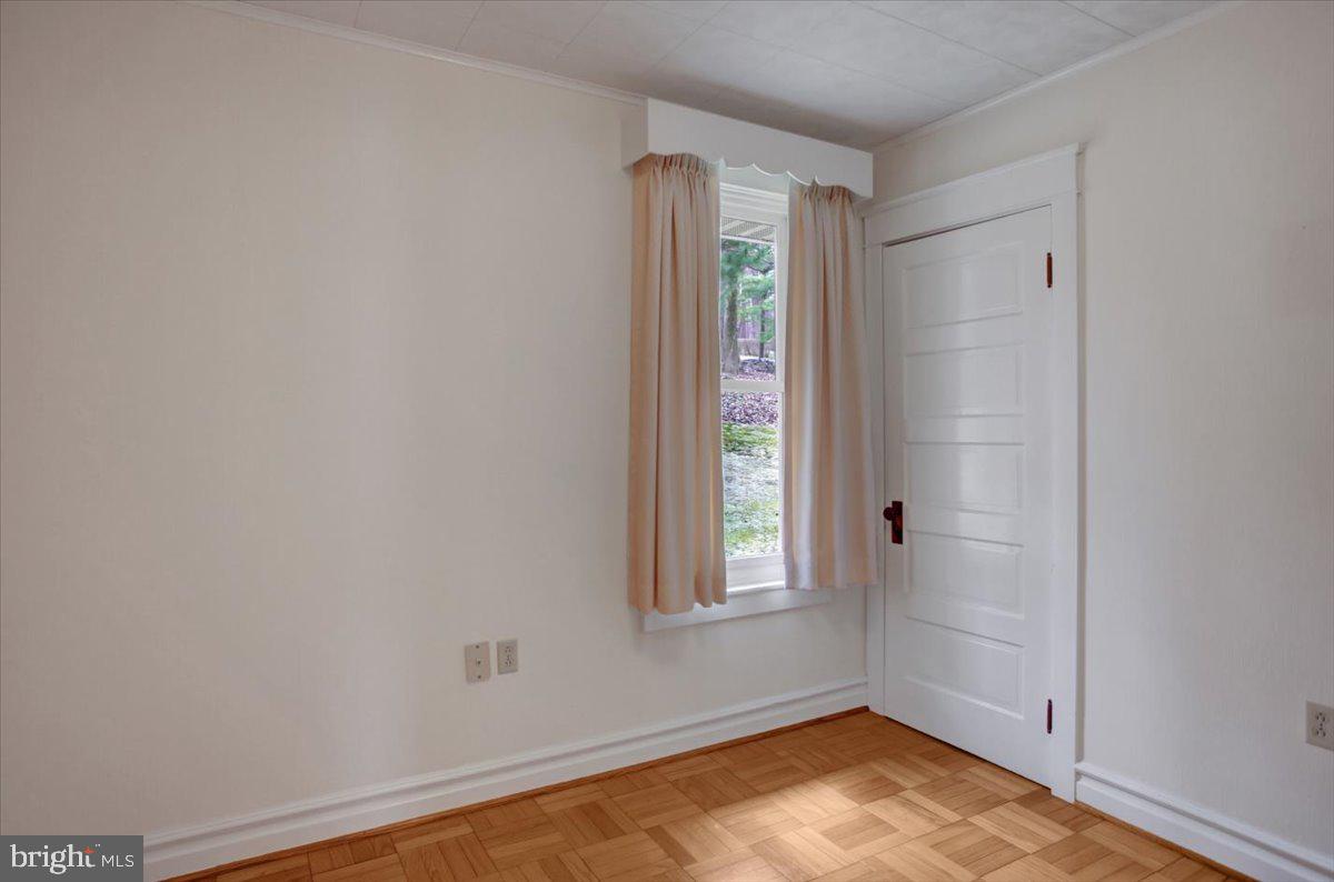 14625 Hilltop Road Cascade, MD 21719 - Photo 28 of 49 an empty room with windows and closet