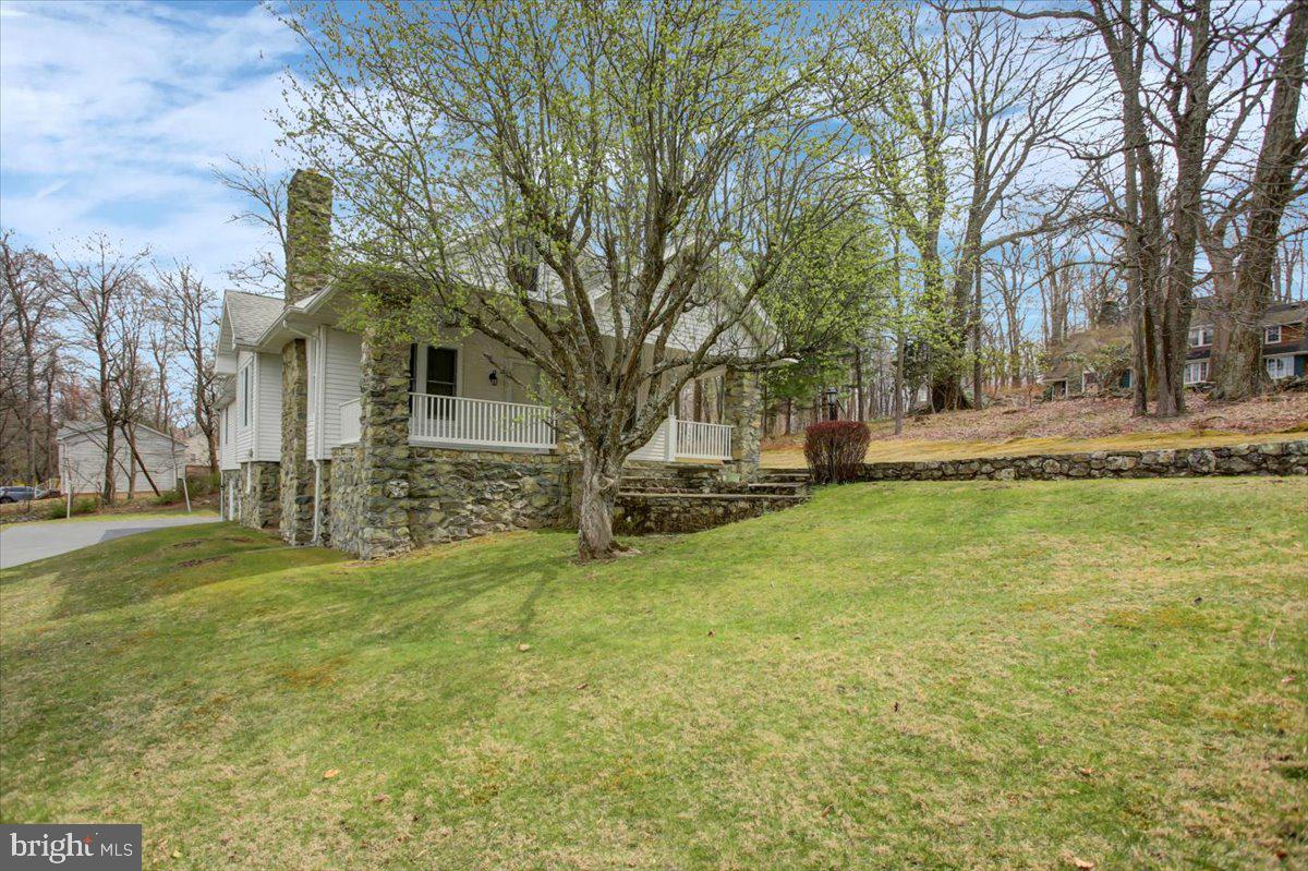 14625 Hilltop Road Cascade, MD 21719 - Photo 4 of 49 a view of a yard in front of the house