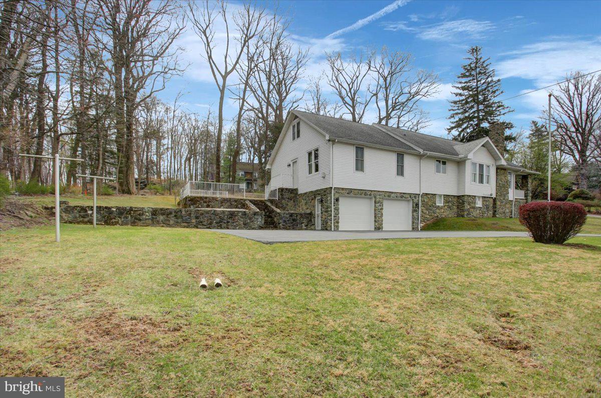 14625 Hilltop Road Cascade, MD 21719 - Photo 7 of 49 a front view of a house with a yard