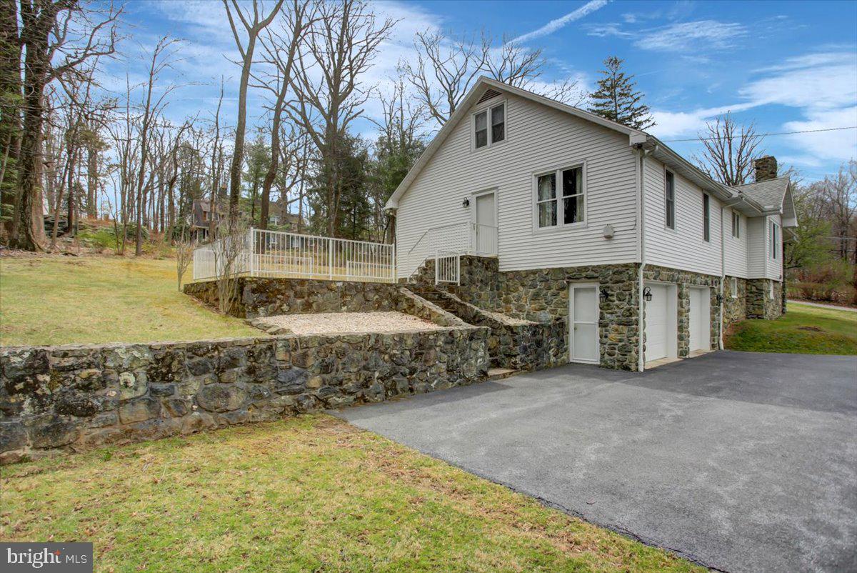 14625 Hilltop Road Cascade, MD 21719 - Photo 8 of 49 a view of a house with backyard