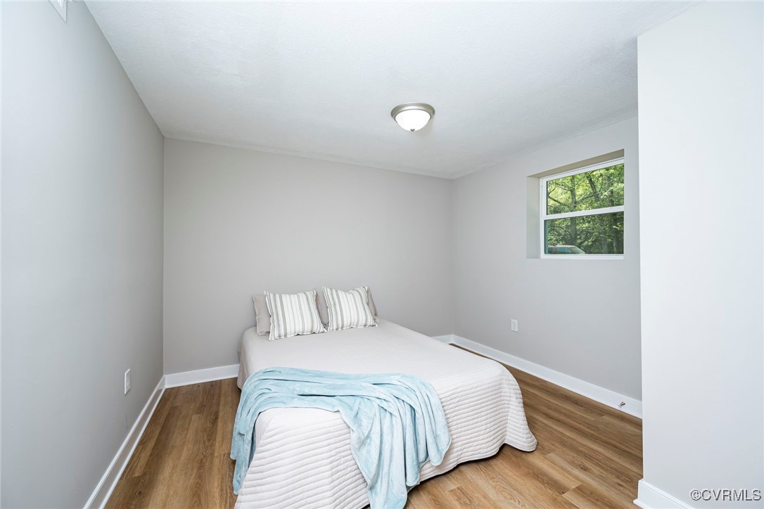 2821 Remington Road Henrico, VA 23231 - Photo 17 of 24 a bedroom with a bed and a window